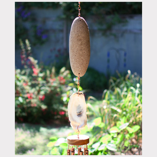 detail, beach stone and oyster shell wind chime