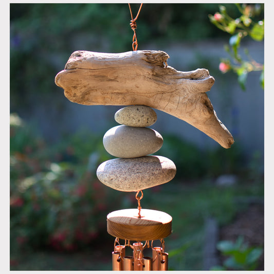 detail, driftwood and beach stone wind chime