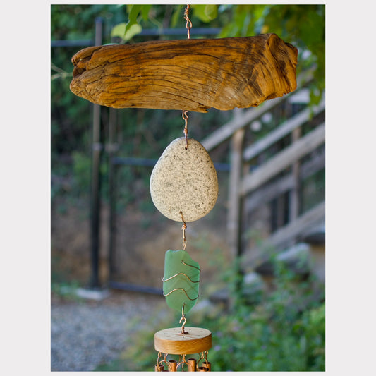Decorative hanging with stones and wood in a natural setting