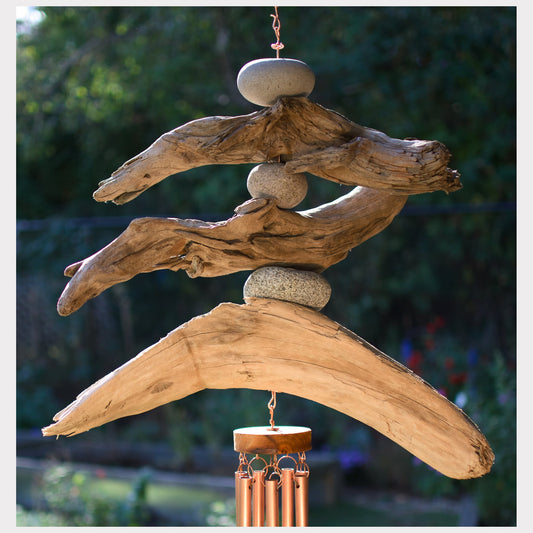 Detail, driftwood and beach stone wind chime.