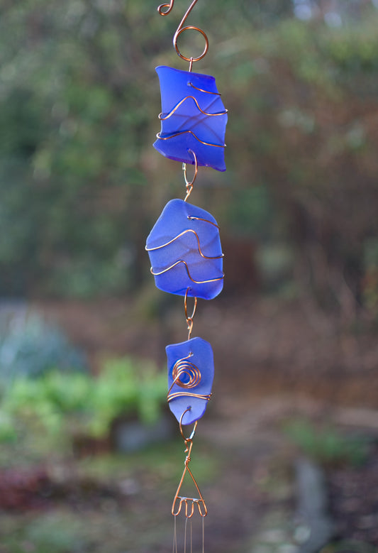 detail, blue glass wind chime