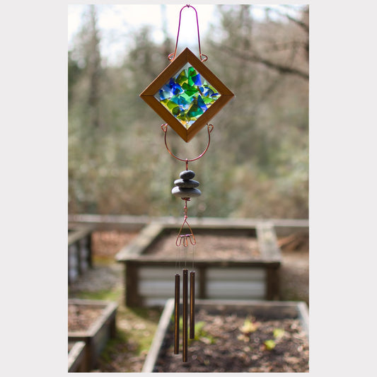 Kaleidoscope wind chime featuring artist-made beach glass, beach stones, and three natural beach stones.